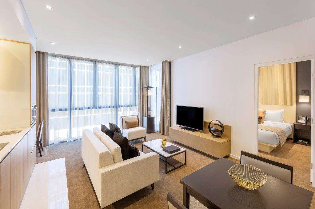 Skye Suites ซิดนีย์ ห้อง รูปภาพ A living room at the hotel